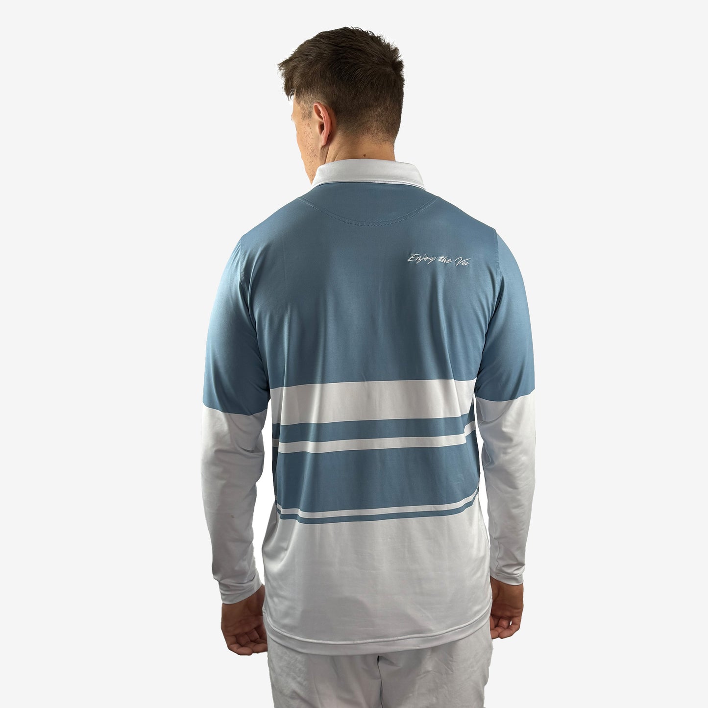 Man wearing a blue and white striped UPF 50+ long-sleeve shirt on a white background Shot from the back.
