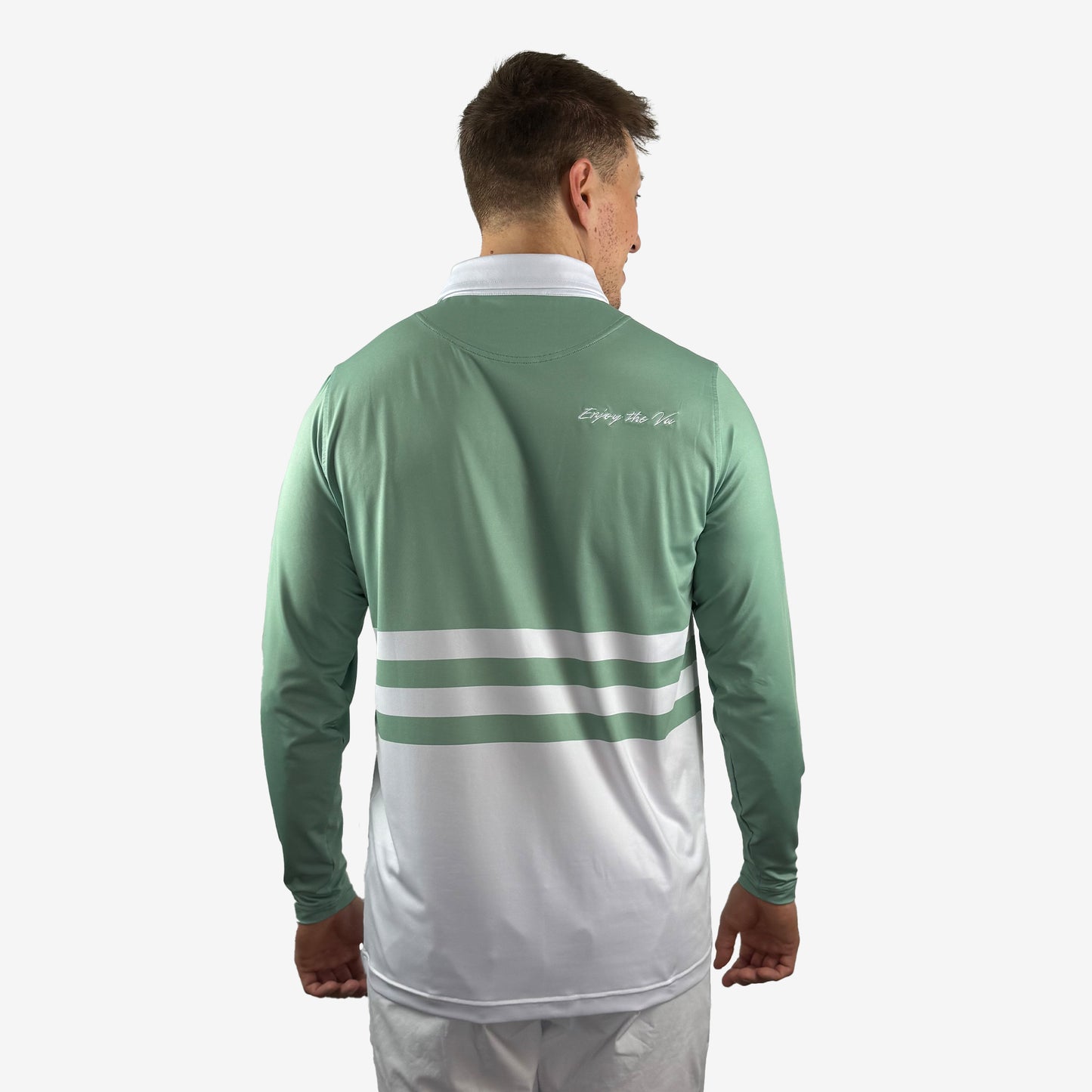 Man wearing a green and white striped UPF 50+ long-sleeve shirt on a white background shot from the back.