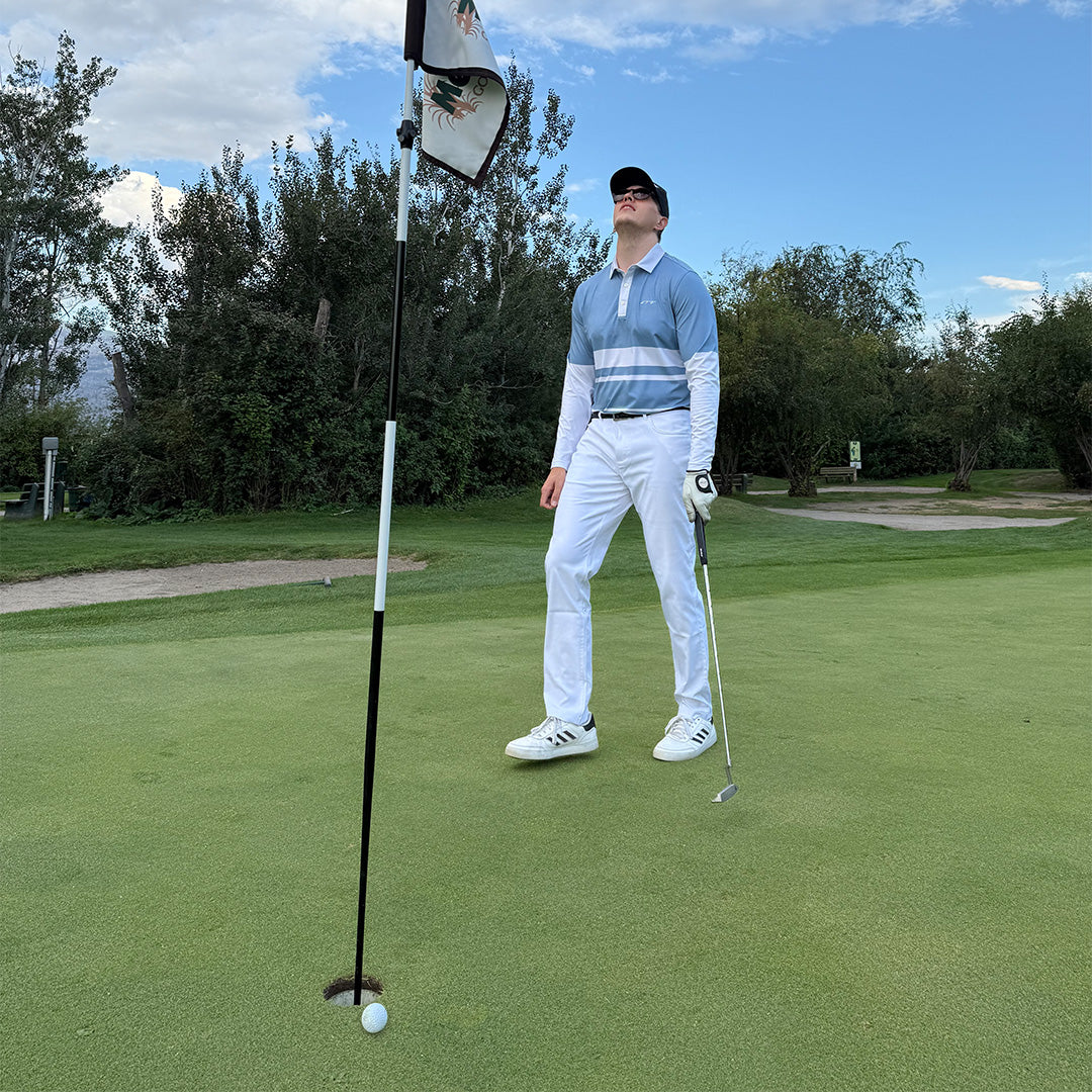 Man wearing the Marble Blue UPF 50+ long sleeve golf polo on an Okanagan golf course — Enjoy the Vu sun protection golf apparel