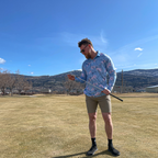 Man wearing the Rose UPF 50+ long sleeve golf polo on an Okanagan golf course — Enjoy the Vu sun protection golf apparel