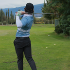 Man wearing the Marble Blue UPF 50+ long sleeve golf polo on an Okanagan golf course — Enjoy the Vu sun protection golf apparel
