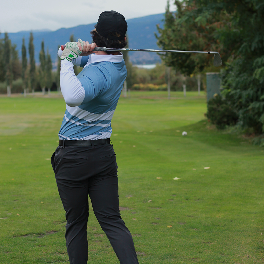 Man wearing the Marble Blue UPF 50+ long sleeve golf polo on an Okanagan golf course — Enjoy the Vu sun protection golf apparel
